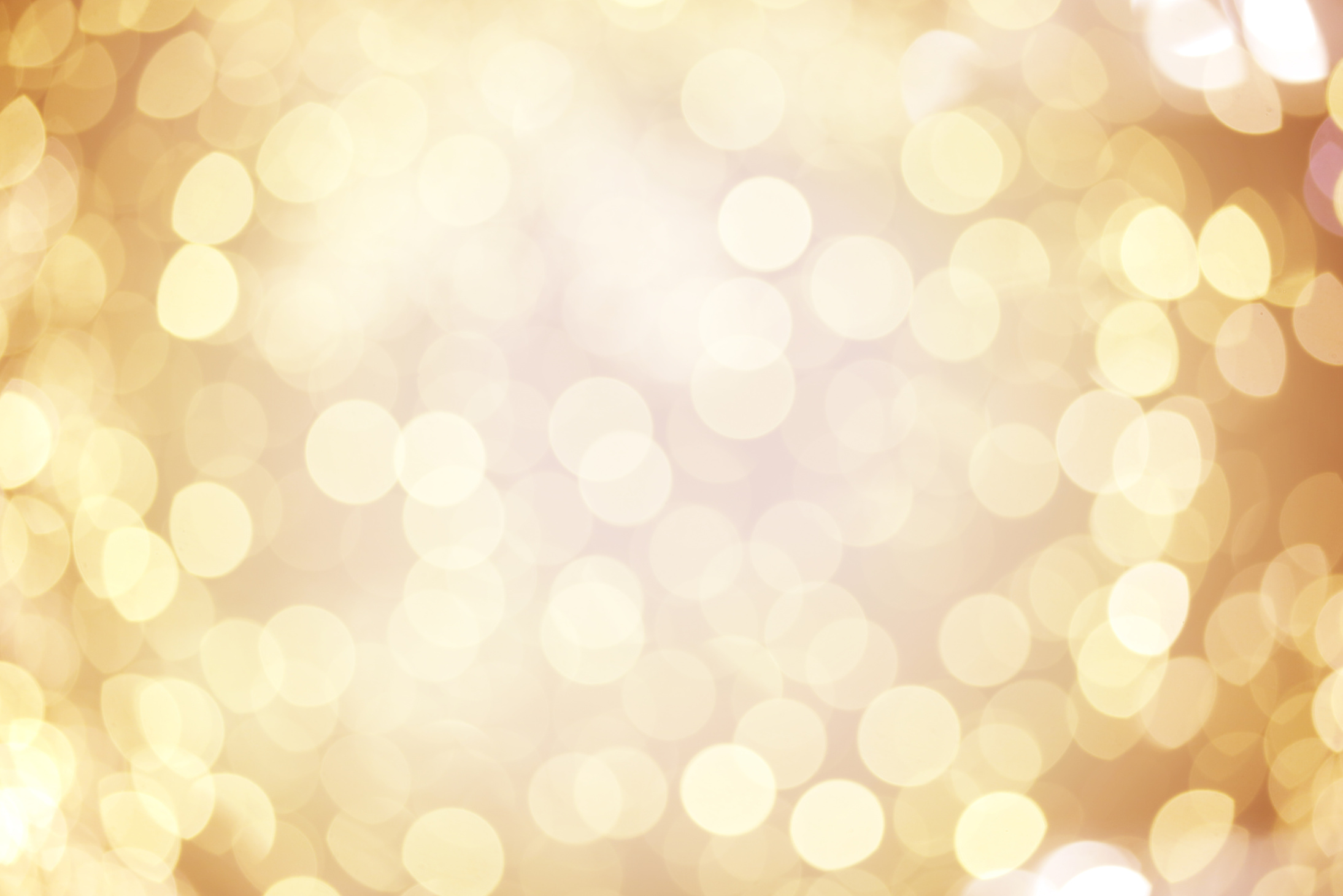 Blurred gold sparkles background